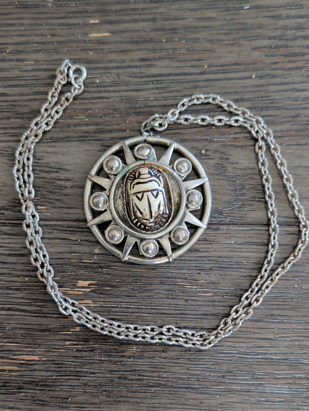 Silver-Tone Sunburst Pendant Necklace with Carved Scarab
